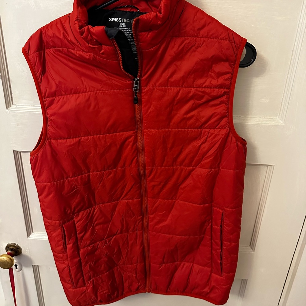 Rust orange Swiss tech puffer